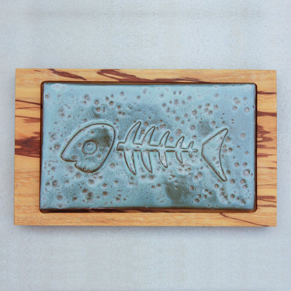 This unique handmade glazed ceramic soap tile & Marblewood tray will look great on any bathroom counter. Raised blue fishbone relief adds a fossilized look. Great for even large bars of soap.